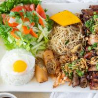 Pho Le'S Hungry Man Combo · Grill chicken, beef, pork, shrimp, shredded pork, egg roll, egg foo young and sunny side up ...