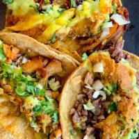 House Taco · choice of tortilla, choice of protein (asada, pollo, pastor), topped with onion, cilantro an...