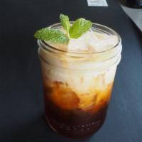 Thai Iced Tea · Homemade sweet Thai iced tea with half and half.