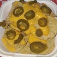 Nacho Cheese · Chips, nacho cheese and pickled jalapeno slices