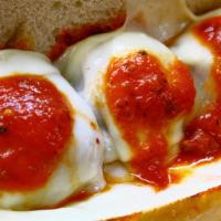 Sicilian Meatball & Cheese · Italian meatballs covered with rich and hearty sauce and melted provolone cheese.