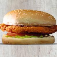 Crispy Chicken Sandwich · Delicious fried chicken on a sesame seed bun with mayo, lettuce, and tomato.