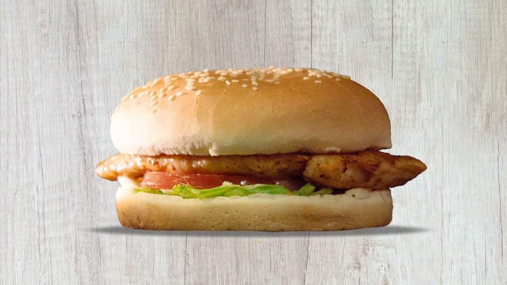 Grilled Chicken Sandwich · Delicious grilled chicken on a sesame seed bun with mayo, lettuce, and tomatoes.