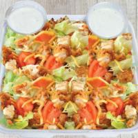 Crispy Chicken Salad · Lettuce, tomatoes, finely-grated cheeses, golden crispy chicken pieces on a bed of fresh sal...