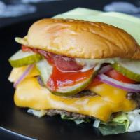 Wagyu Smash Burger · Two fresh-ground Rosewood wagyu beef patties, American cheese, 