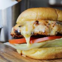 Grilled Chicken Burger · Ground chicken patty, cheddar cheese, chipotle mayo, sundried tomato relish, lettuce. Served...