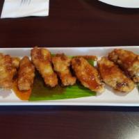 Spicy Chicken Wings · Spicy. 7 pieces chicken wings with celery and ranch dressing.