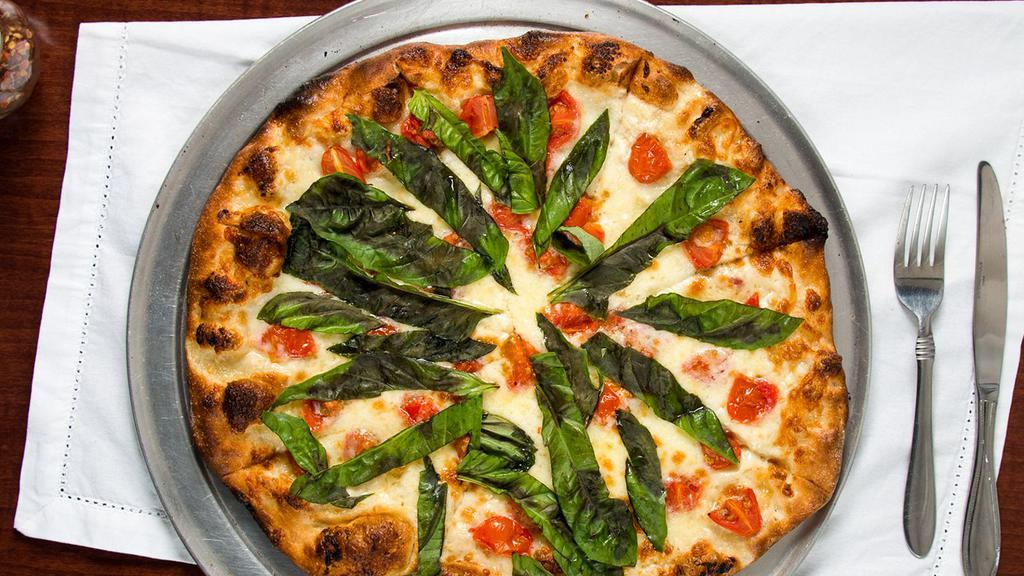 Italian Pizza (14'' 8 Slices) · Olive oil, garlic, fresh Mozzarella cheese, tomatoes and basil.