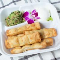 Crispy Shrimp Taquitos · Eight corn tortillas stuffed with shrimp, mixed veggies, and cheese. Served with a side of f...
