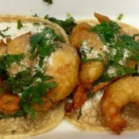 Shrimp Taco · Grilled shrimp, cabbage, pico de gallo & tartar sauce