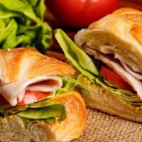 Turkey Classic Sandwich · Turkey, lettuce, tomato, mayonnaise & mustard.