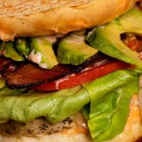 Roasted Chicken Club With Avocado Panini · Herb chicken breast, jack cheese, bacon, ketchup mayo spread, lettuce, tomato & avocado on f...