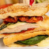 Tuscan Turkey · Smoked turkey, provolone cheese, basil, roasted red cherry tomato, red bell pepper pesto on ...