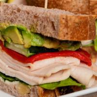 California Turkey · Turkey, avocado, romaine lettuce, roasted red bell peppers, mixed greens, cucumber and mayo ...