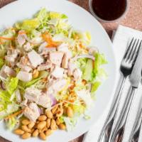 Chinese Chicken Salad  · Oven roasted chicken, romaine lettuce, carrots, red onion, cabbage, celery and roasted peanu...