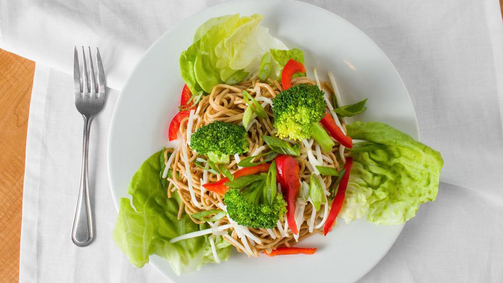 Asian Noodle Salad · Soy-marinated noodles tossed in ginger vinaigrette dressing with broccoli, bell pepper, bean sprouts, and green onions & peanuts served on butter lettuce leaf.