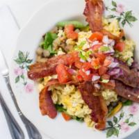 Breakfast Bowl · Bacon or sausage, spinach, potatoes, cheese, scrambled eggs, pico de gallo.