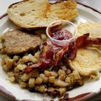 Big Dave'S Breakfast · 2 eggs, bacon or sausage, potatoes, fresh baked country toast and strawberry preserves.