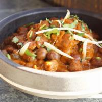 Chana Masala · Gluten free. Spicy. Vegetarian. Chickpeas. onion. tomato. cilantro. indian spices.