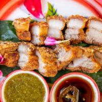 Crispy Pork Belly · With sweet soy sauce.