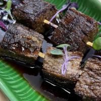 Grilled Beef Stew Skewers · Tendered stew beef in Thai spices.