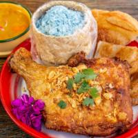Hat Yai Chicken & Curry · Southern Thai style fried chicken with fried sharrots and house curry served with Jasmine ri...