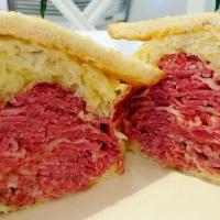 Rueben · Corned Beef, Swiss Cheese and Sauerkraut with your Choice of Mustard, Russian Dressing or Bo...