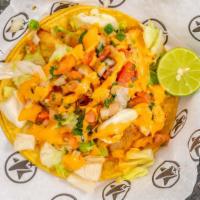 Fish Taco · Cabbage, pico de gallo, spicy chipotle sauce