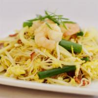 Singapore Noodles · Shrimp, BBQ pork slices, curry powder, eggs, onions, green onions, bean sprouts and rice ver...