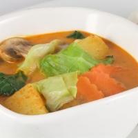 Veggie Curry · Mixed veggie, potatoes in yellow curry sauce.