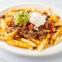 Papa Nachos · Choice of Protein, Beans, Cheese, Traditional Guacamole, Sour Cream & Tomatoes.