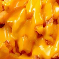 Loaded Fries W/Melted Cheese · Melted Cheddar Cheese on side with fries