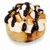 Campfire S'More Roll* · marshmallow frosting, toppings of marshmallows, graham cookies and chocolate Sauce