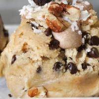*Cookie Dough Scoop - German Chocolate - Cinnadoodle Scoop · our homemade cookie dough topped with a dollop of chocolate frosting, a brownie bite morsel,...