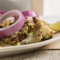 Malai Kabob · Succulent chunks of chicken is marinated in sour cream and yogurt and cooked for perfect fla...