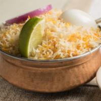 Goat Biryani · One of the prime biryani made of long grained basmati rice cooked with succulent pieces of g...
