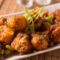 Gobi Manchuria · Vegetarian. Cauliflower florets marinated in a spiced batter, deep fried and tossed in soy s...