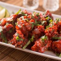 Chicken 65 · Boneless chicken cubes marinated in hand made indian masala's and deep fried.