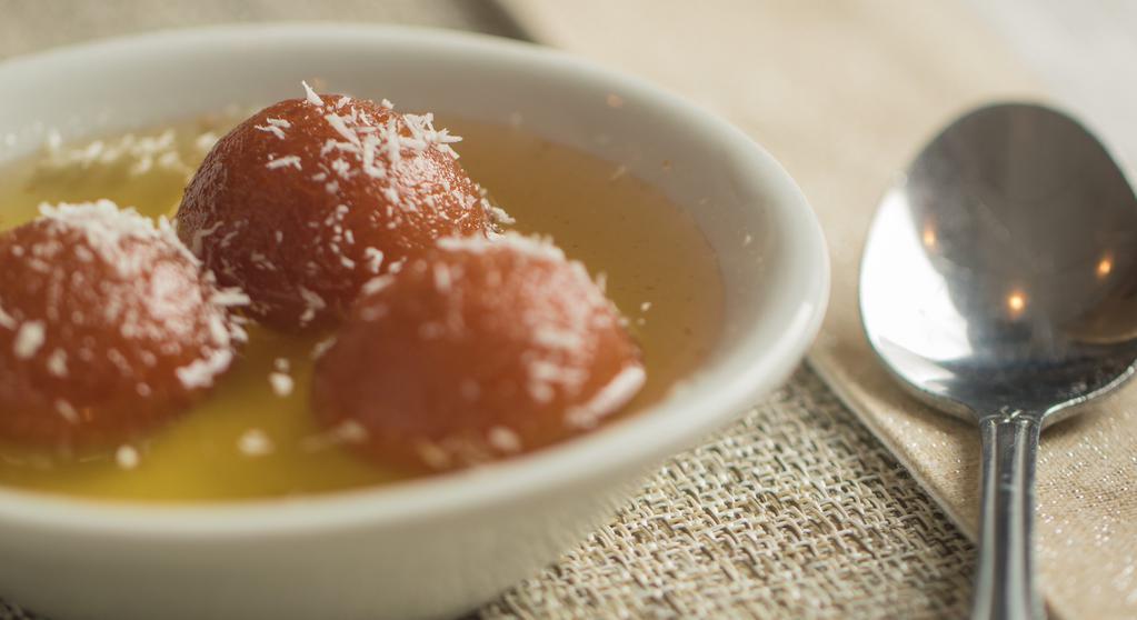 Gulab Jamun · Dumplings of fresh milk condensed and deep fried served in thick sugar syrup.