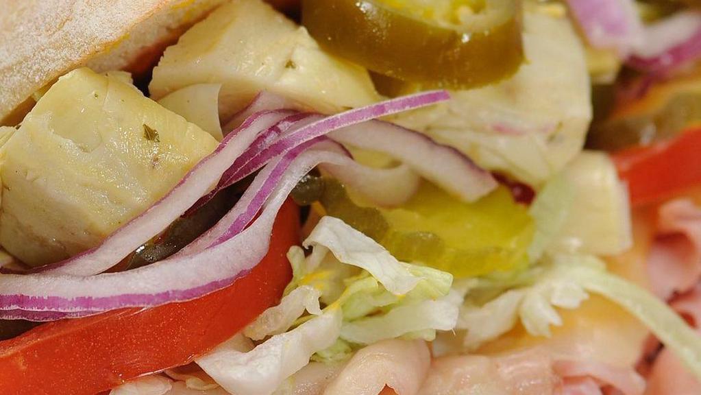 Roxie Special Sandwich · Mortadella, ham, salami, 2 cheeses, artichoke hearts, and the works.