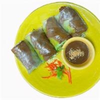 Grilled Beef Spring Roll · Grilled and marinated beef with lettuce, cilantro, noodles, wrapped in rice paper.