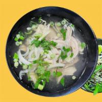 Chicken Pho Soup · Rice noodles with white meat and dark meat in chicken broth.