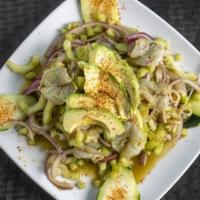 Aguachile · Raw Shrimp Marinated with Lime Juice. Onions, Avocado, Cucumber & Chillies.
