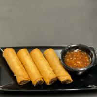 Egg Rolls (4) · Pork and assorted vegetables eggrolls served with sweet chili sauce.
