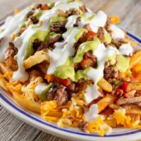 Gyro Philly Fries · Delicious gyro meat with bell peppers, onions, tomatoes, mushrooms, cheese, and feta all on ...