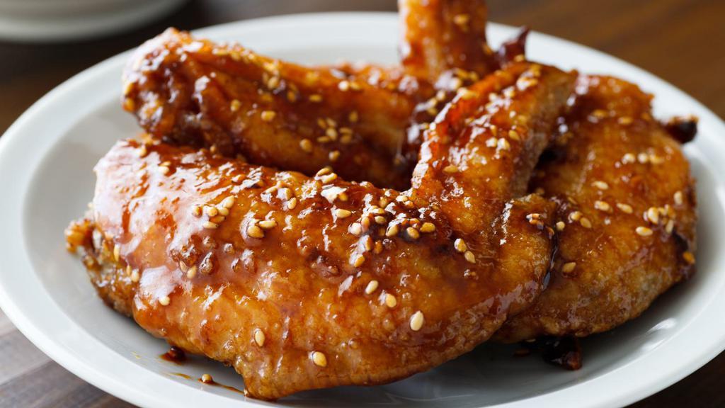 Teriyaki Chicken Wings · Delicious crispy wings tossed in sweet teriyaki sauce.