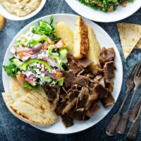Gyro Platter · Yummy gyro meat with salad, rice, salata, tzatziki sauce, hummus, and pita bread.