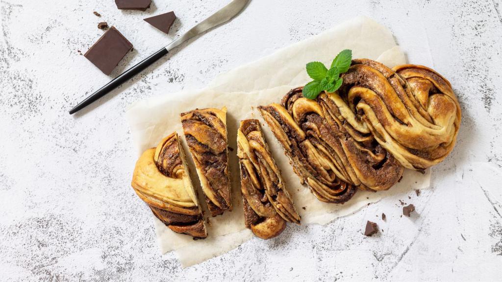 Mediterranean Nut Roll · Delicious filo pastry with honey, chocolate, and nuts.