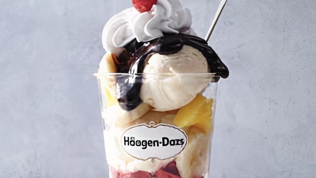 Banana Split Dazzler Sundae · Vanilla ice cream layered with bananas, pineapple, strawberry and hot fudge topped with whipped cream and a cherry. Served with toppings.