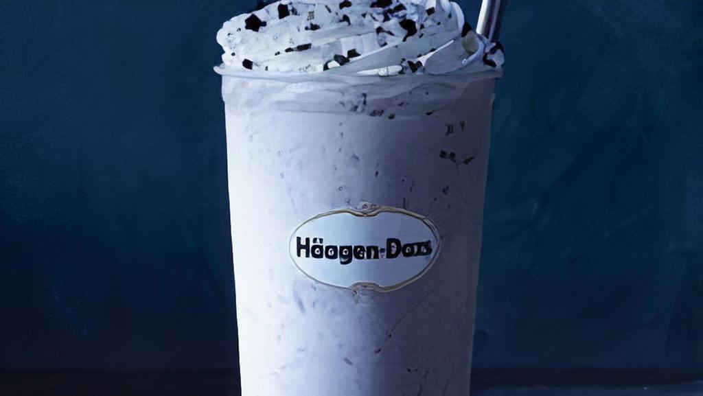 Cookies & Cream Milkshake · Pieces of crunchy chocolate cookies in vanilla ice cream blended and topped with whipped cream and cookie crunch. Served with toppings.